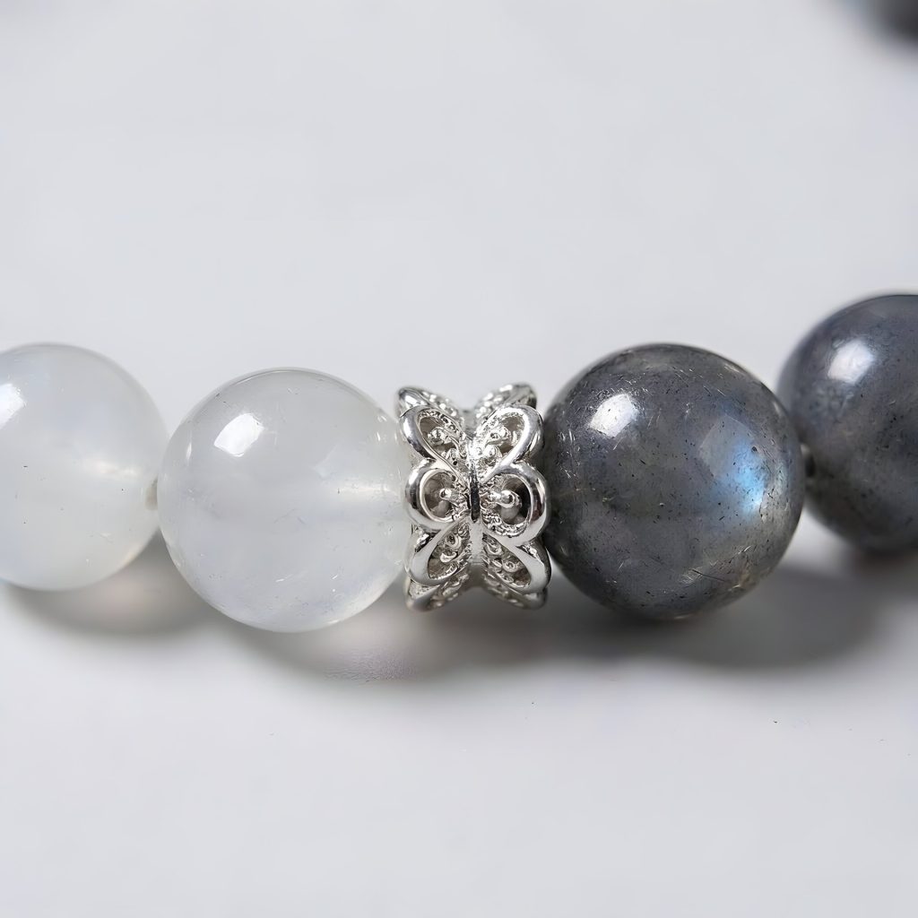 925 sterling silver butterfly spacer detail between beads