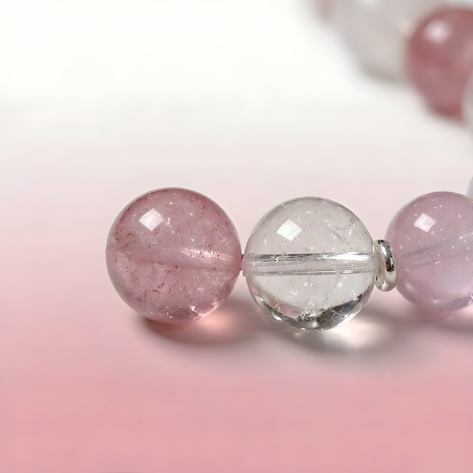 Rose Quartz and Clear Quartz beads with a 925 sterling silver accent from the VenusGlow Bracelet